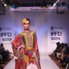 Model walks the ramp displaying Rajdeep Ranawat design at India Runway Week 2013