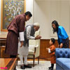 King of Bhutan, the Bhutan Queen and Crown Prince meeting the PM Modi